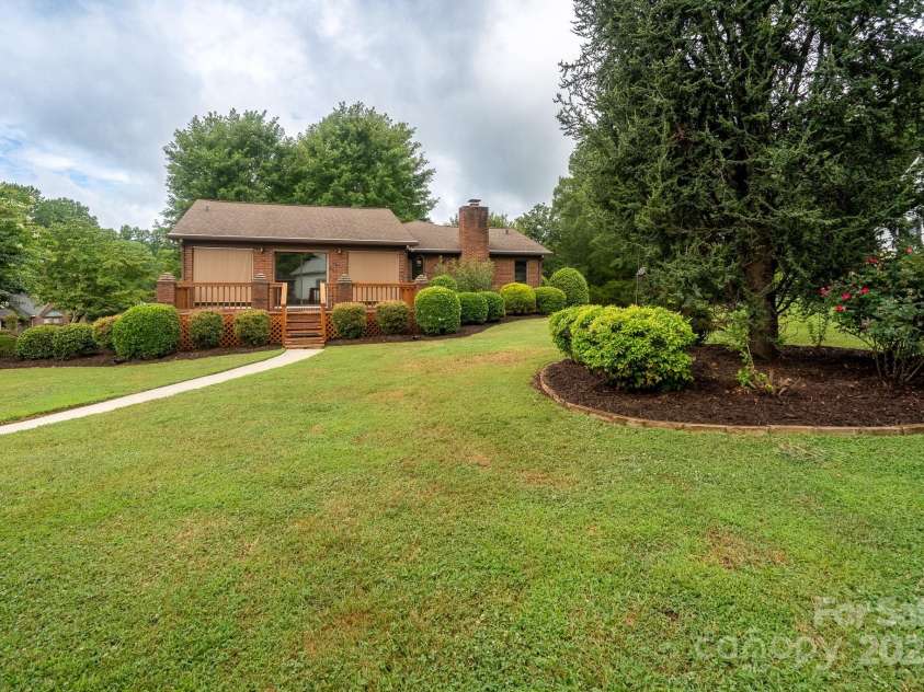 614 Azalea Lane, China Grove, NC 28023.  MLS# CAR4280599, YatesRealty ID 25550. Back yard view looking toward rear deck.