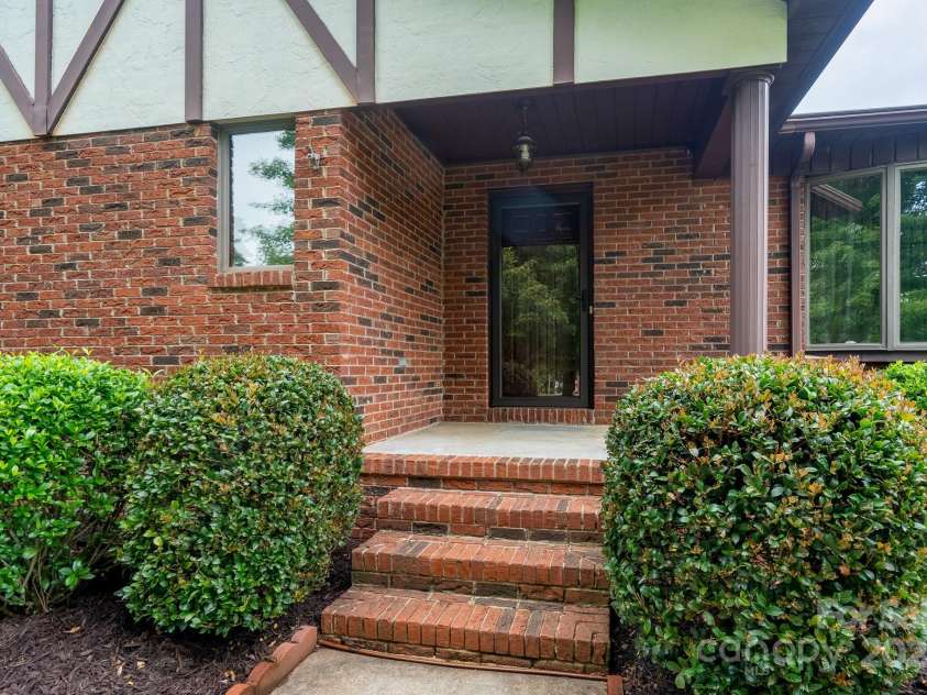 614 Azalea Lane, China Grove, NC 28023.  MLS# CAR4280599, YatesRealty ID 25550. Front porch and entrance.