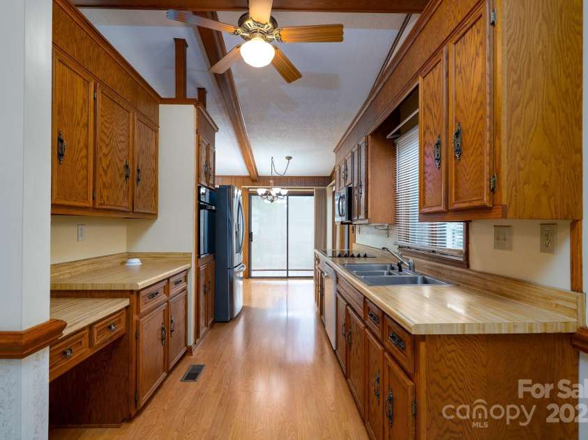 614 Azalea Lane, China Grove, NC 28023.  MLS# CAR4280599, YatesRealty ID 25550. Kitchen has computer niche.