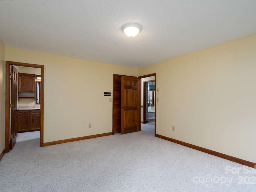 614 Azalea Lane, China Grove, NC 28023.  MLS# CAR4280599, YatesRealty ID 25550. Primary bedroom with ensuite bathroom.