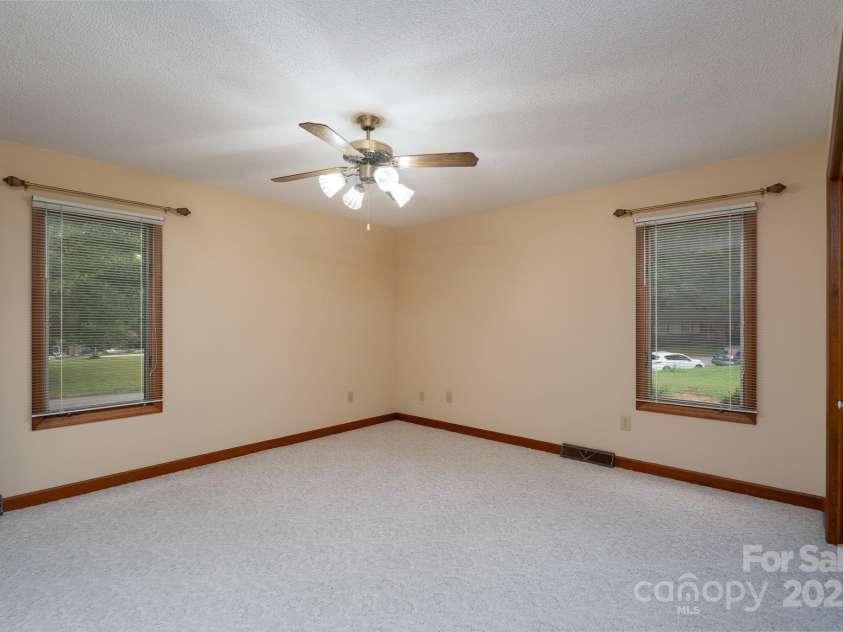 614 Azalea Lane, China Grove, NC 28023.  MLS# CAR4280599, YatesRealty ID 25550. Primary bedroom with ensuite bathroom.