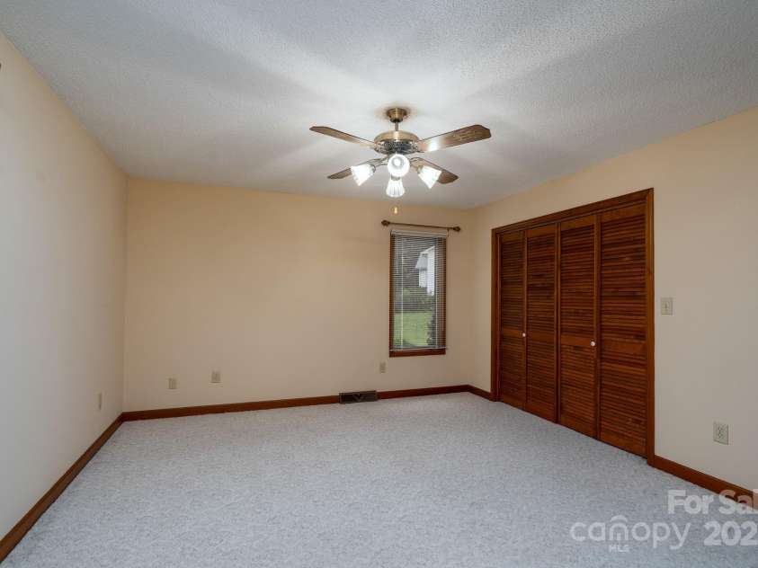 614 Azalea Lane, China Grove, NC 28023.  MLS# CAR4280599, YatesRealty ID 25550. Second bedroom closet.
