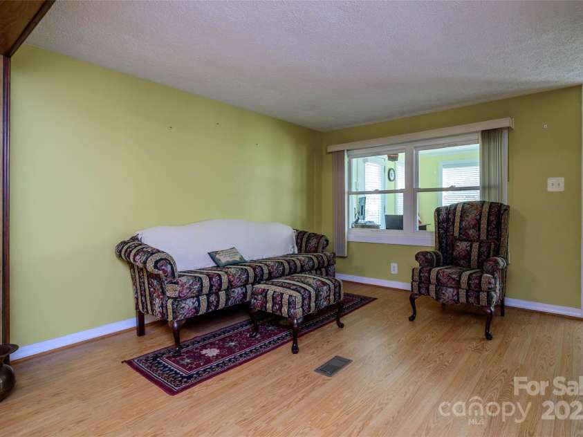 4720 Brevard Road, Horse Shoe, NC 28742.  MLS# CAR4278026, YatesRealty ID 25552. Living Room