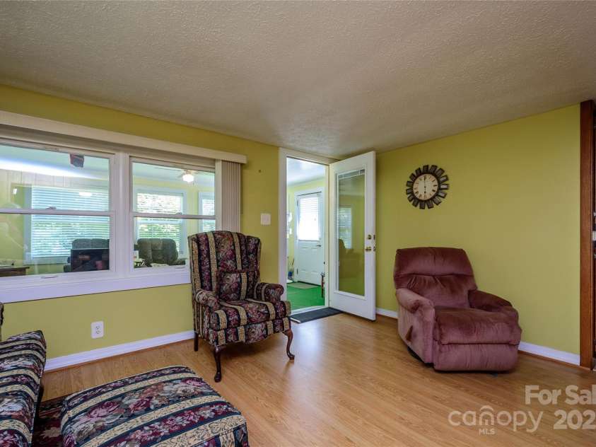 4720 Brevard Road, Horse Shoe, NC 28742.  MLS# CAR4278026, YatesRealty ID 25552. Living Room