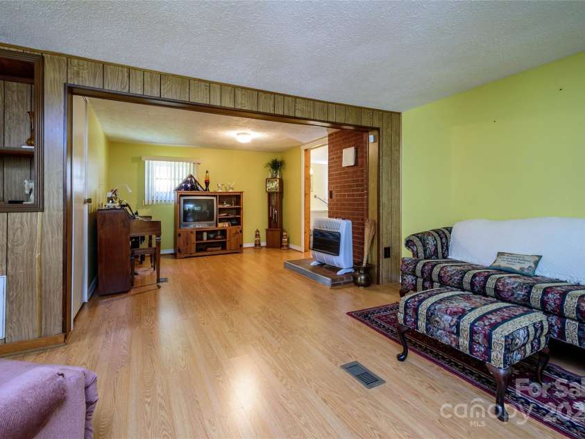 4720 Brevard Road, Horse Shoe, NC 28742.  MLS# CAR4278026, YatesRealty ID 25552. Living Room