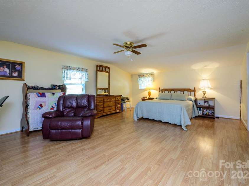 4720 Brevard Road, Horse Shoe, NC 28742.  MLS# CAR4278026, YatesRealty ID 25552. Primary Bedroom