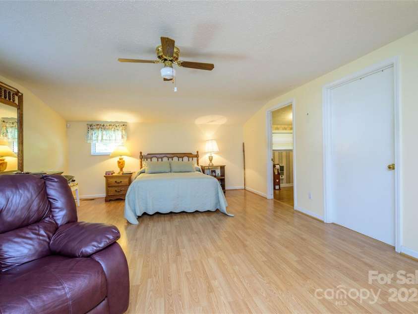 4720 Brevard Road, Horse Shoe, NC 28742.  MLS# CAR4278026, YatesRealty ID 25552. Primary Bedroom