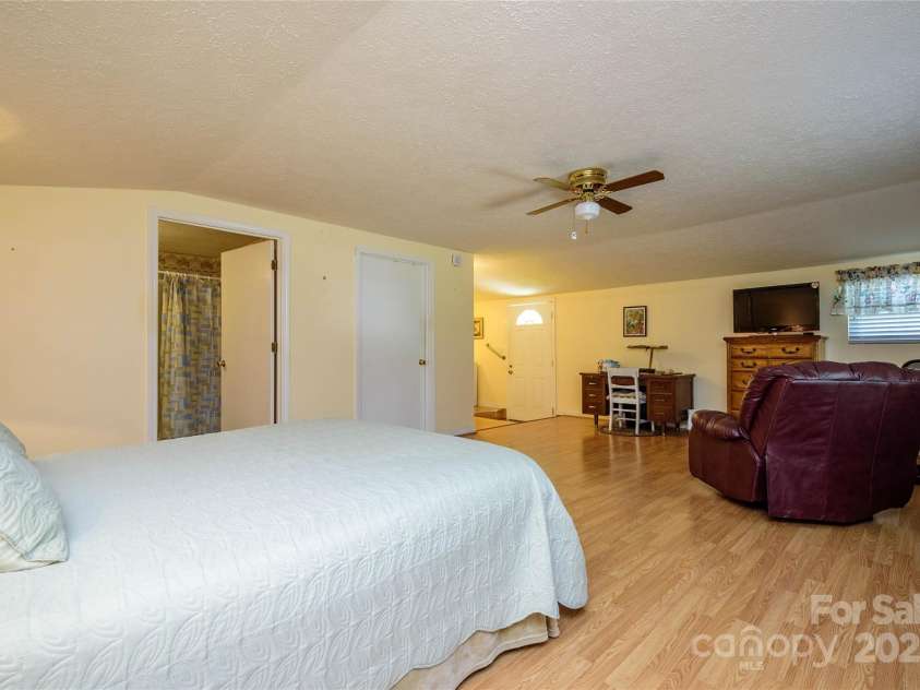 4720 Brevard Road, Horse Shoe, NC 28742.  MLS# CAR4278026, YatesRealty ID 25552. Primary Bedroom