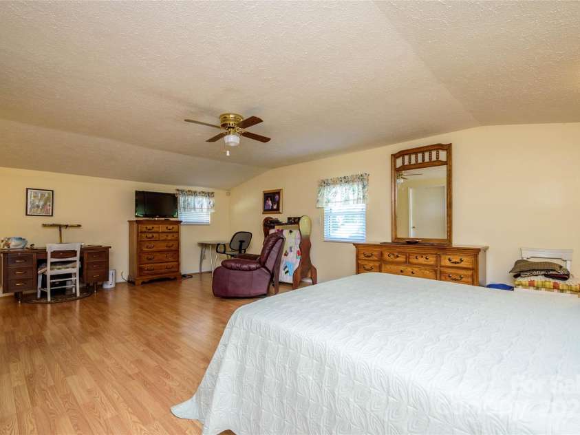 4720 Brevard Road, Horse Shoe, NC 28742.  MLS# CAR4278026, YatesRealty ID 25552. Primary Bedroom