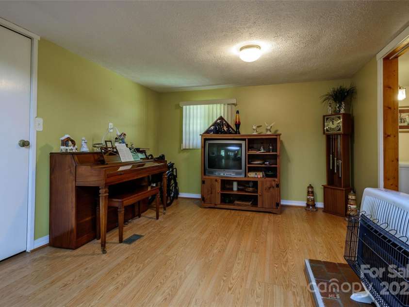 4720 Brevard Road, Horse Shoe, NC 28742.  MLS# CAR4278026, YatesRealty ID 25552. Primary Bedroom