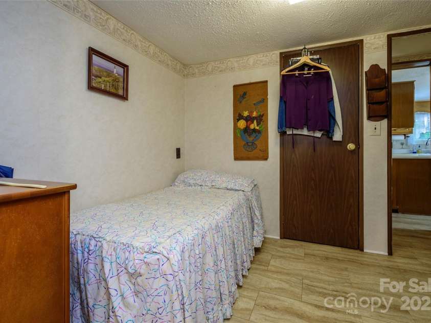 4720 Brevard Road, Horse Shoe, NC 28742.  MLS# CAR4278026, YatesRealty ID 25552. Second Bedroom