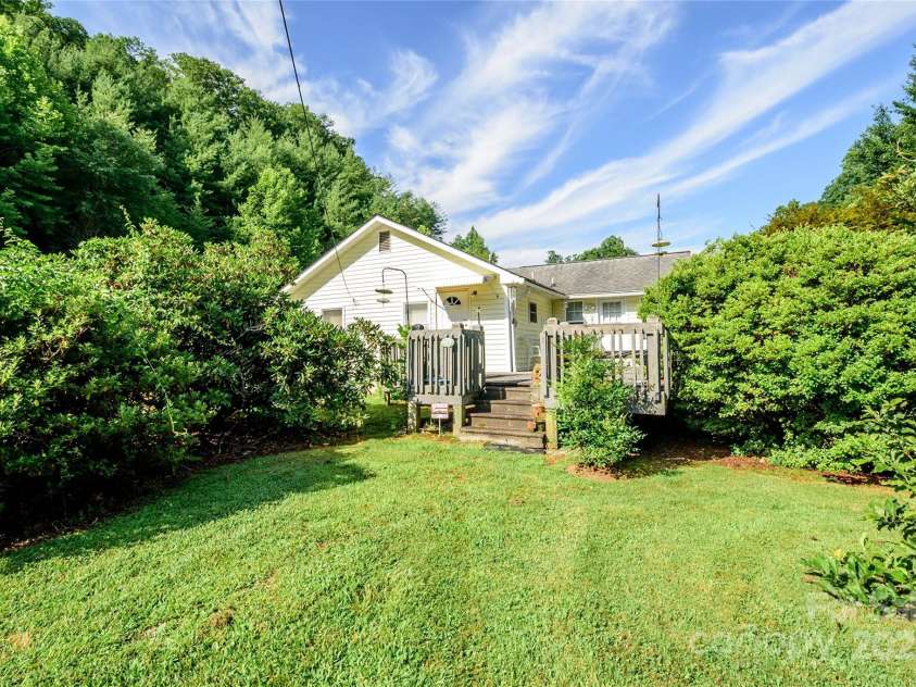 4720 Brevard Road, Horse Shoe, NC 28742.  MLS# CAR4278026, YatesRealty ID 25552. Side porch