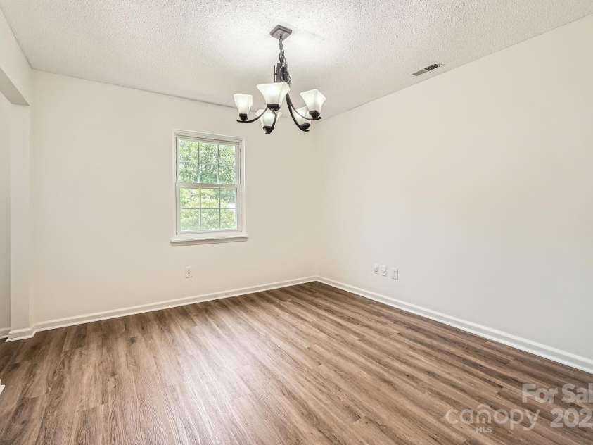 6221 Round Hill Road, Charlotte, NC 28211.  MLS# CAR4264179, YatesRealty ID 25553. Formal dining room.