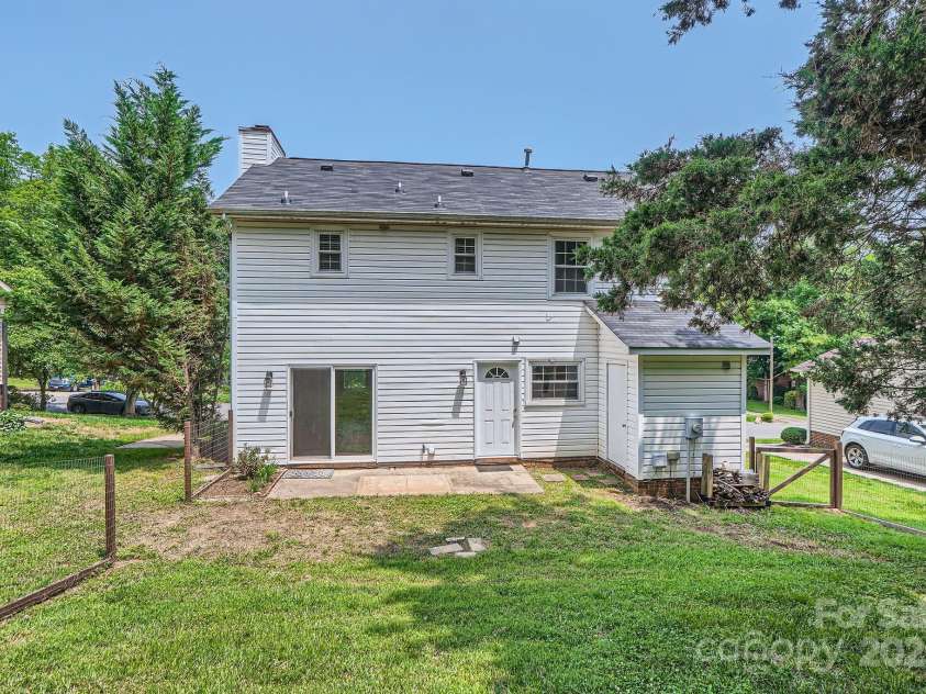6221 Round Hill Road, Charlotte, NC 28211.  MLS# CAR4264179, YatesRealty ID 25553. View of the sizable yard and brand new roof!