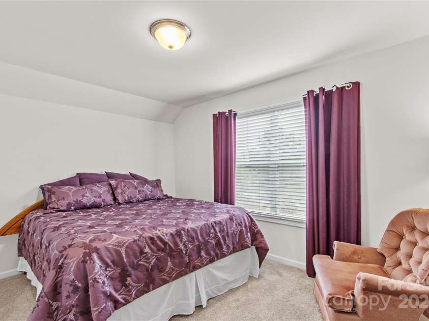 117 Cup Chase Drive, Mooresville, NC 28115.  MLS# CAR4279101, YatesRealty ID 25558. Bedroom 4 overlooks rear yard