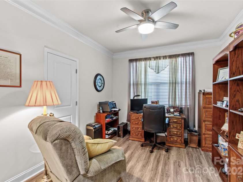 117 Cup Chase Drive, Mooresville, NC 28115.  MLS# CAR4279101, YatesRealty ID 25558. Flex Room with ceiling fan, LVP flooring, closet, crown molding