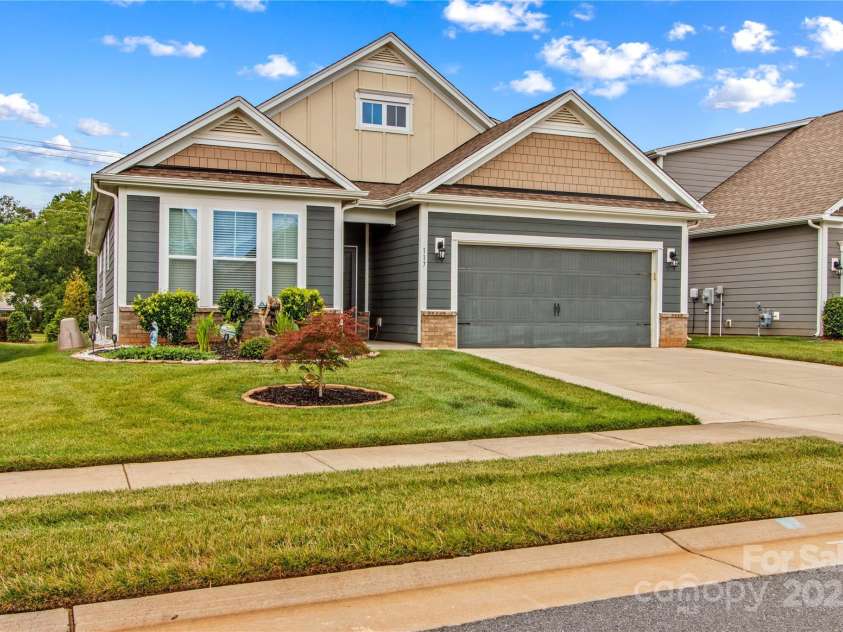 117 Cup Chase Drive, Mooresville, NC 28115.  MLS# CAR4279101, YatesRealty ID 25558. HardiPlank siding and board and batten