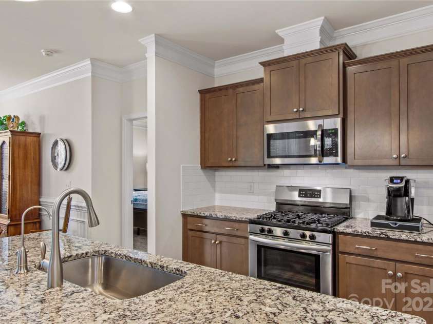 117 Cup Chase Drive, Mooresville, NC 28115.  MLS# CAR4279101, YatesRealty ID 25558. Kitchen with subway tile backsplash