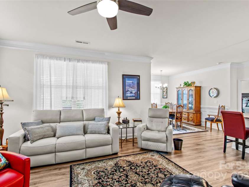 117 Cup Chase Drive, Mooresville, NC 28115.  MLS# CAR4279101, YatesRealty ID 25558. Living Room, dining area