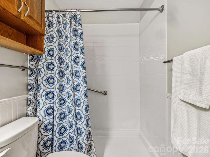 200 River Ridge Drive, Burnsville, NC 28714.  MLS# CAR4381745, YatesRealty ID 25559. Bathroom in Primary Bedroom