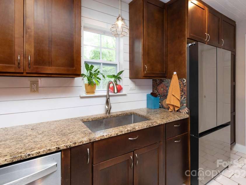 14 New Bern Drive, Fletcher, NC 28732.  MLS# CAR4277461, YatesRealty ID 25567. 2025 dishwasher and 2023 fridge