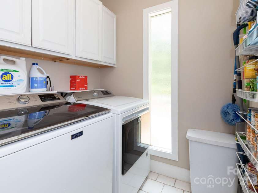 14 New Bern Drive, Fletcher, NC 28732.  MLS# CAR4277461, YatesRealty ID 25567. Laundry off kitchen -2023 washer & dryer