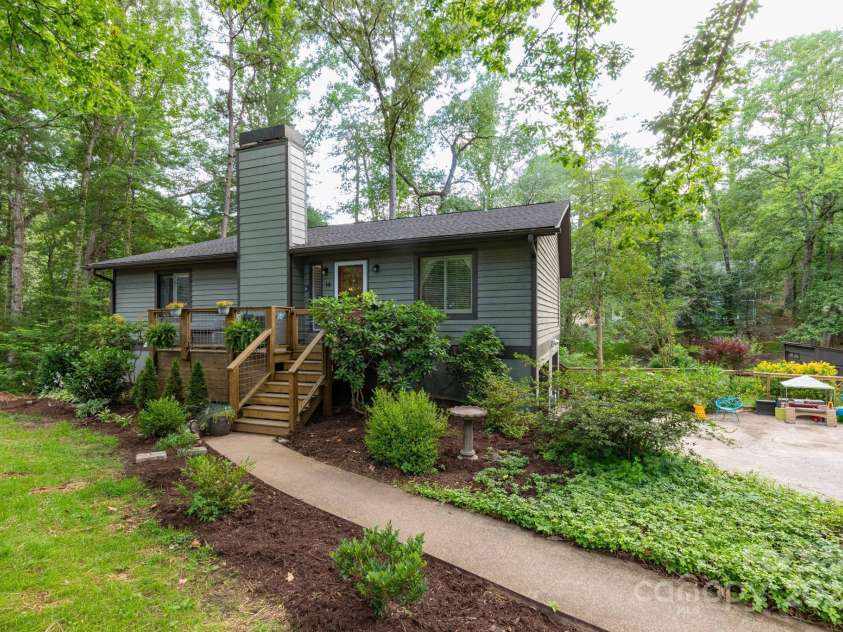 14 New Bern Drive, Fletcher, NC 28732.  MLS# CAR4277461, YatesRealty ID 25567. Mature landscaping