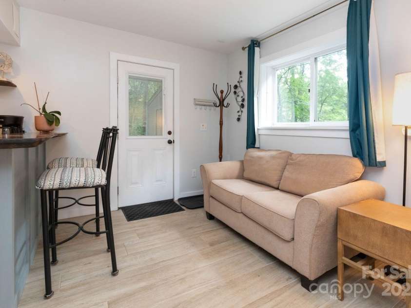 14 New Bern Drive, Fletcher, NC 28732.  MLS# CAR4277461, YatesRealty ID 25567. Studio apt in lower level with outside entrance