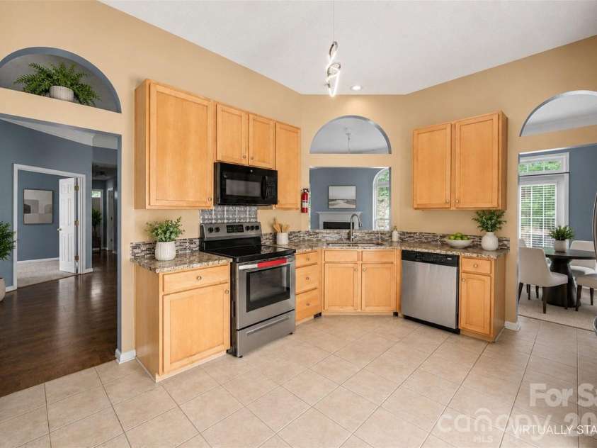 10026 Dauphine Drive, Charlotte, NC 28216.  MLS# CAR4385192, YatesRealty ID 25574. Virtually staged