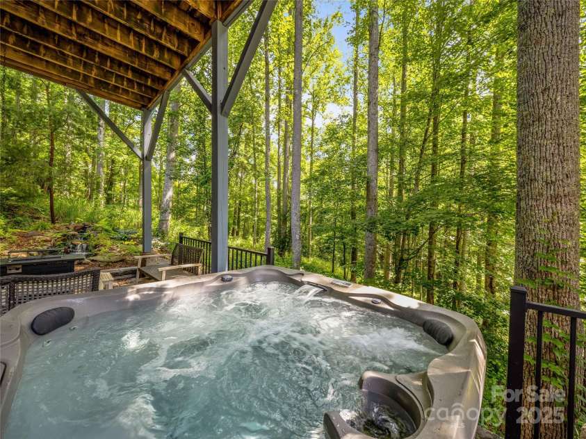 37 Gaston Mountain Road, Asheville, NC 28806.  MLS# CAR4273933, YatesRealty ID 25574. Covered patio w/hot tub