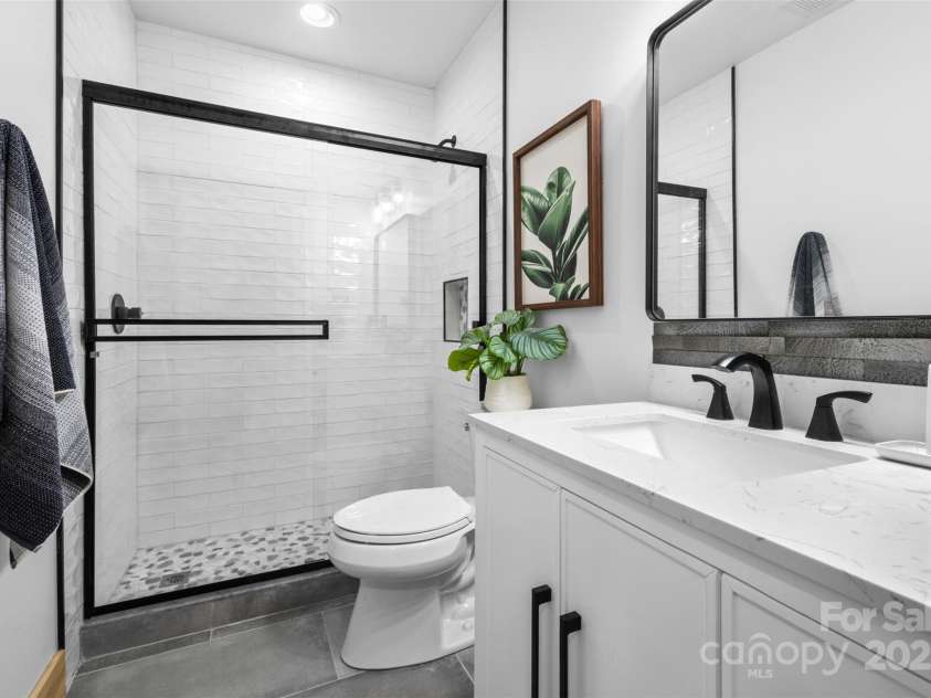 527 Cedar Trail, Fleetwood, NC 28626.  MLS# CAR4271536, YatesRealty ID 25576. Full bathroom downstairs