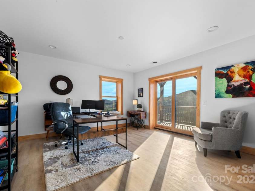 527 Cedar Trail, Fleetwood, NC 28626.  MLS# CAR4271536, YatesRealty ID 25576. Large office downstairs with access to lower deck