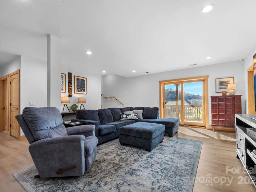 527 Cedar Trail, Fleetwood, NC 28626.  MLS# CAR4271536, YatesRealty ID 25576. Second living area with access to lower deck