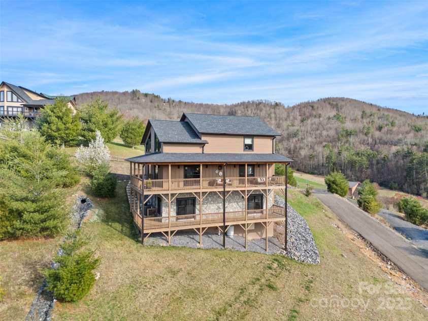 527 Cedar Trail, Fleetwood, NC 28626.  MLS# CAR4271536, YatesRealty ID 25576. Two large wrap around decks