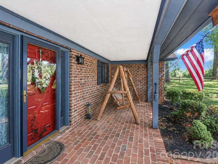 156 Monte Vista Road, Statesville, NC 28625.  MLS# CAR4379805, YatesRealty ID 25577. Deep front porch