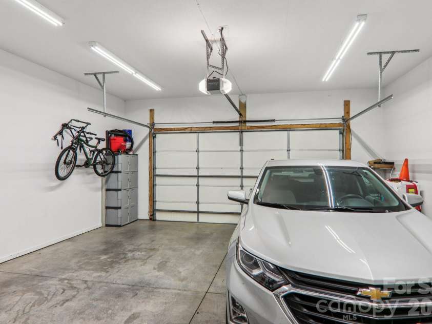 6 Wagon Trace, Flat Rock, NC 28731.  MLS# CAR4374692, YatesRealty ID 25583. 2 car garage main level