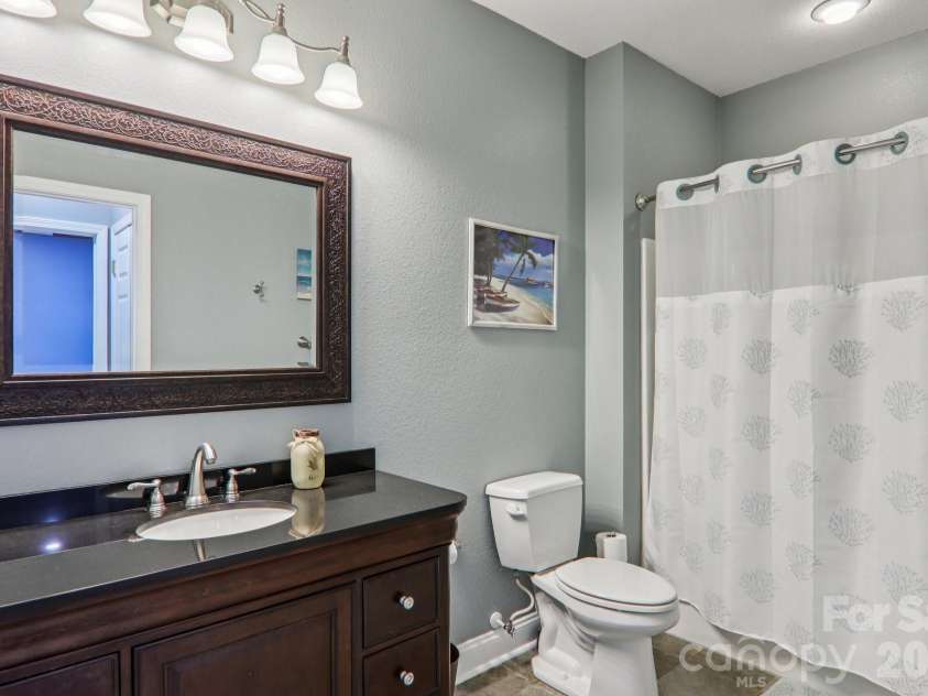 6 Wagon Trace, Flat Rock, NC 28731.  MLS# CAR4374692, YatesRealty ID 25583. Guest bathroom