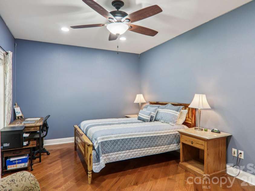 6 Wagon Trace, Flat Rock, NC 28731.  MLS# CAR4374692, YatesRealty ID 25583. Main level guest bedroom