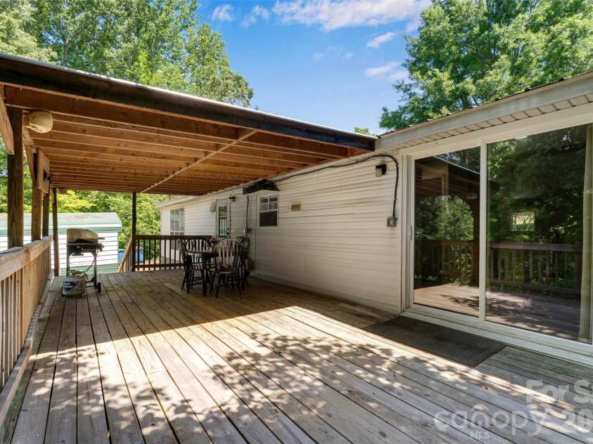 5029 Mundy Lane, Denver, NC 28037.  MLS# CAR4379646, YatesRealty ID 25585. Back deck 