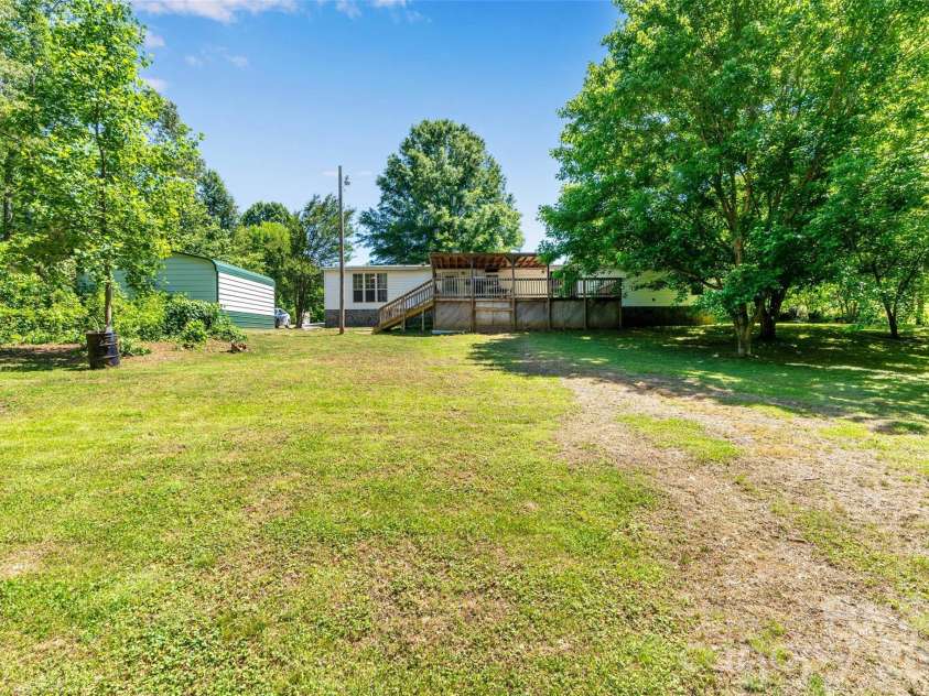 5029 Mundy Lane, Denver, NC 28037.  MLS# CAR4379646, YatesRealty ID 25585. View from down in the backyard 