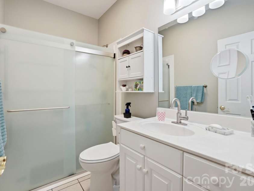 258 Glenwood Drive, Oakboro, NC 28129.  MLS# CAR4384910, YatesRealty ID 25587. Hall bath services BR2 & 3