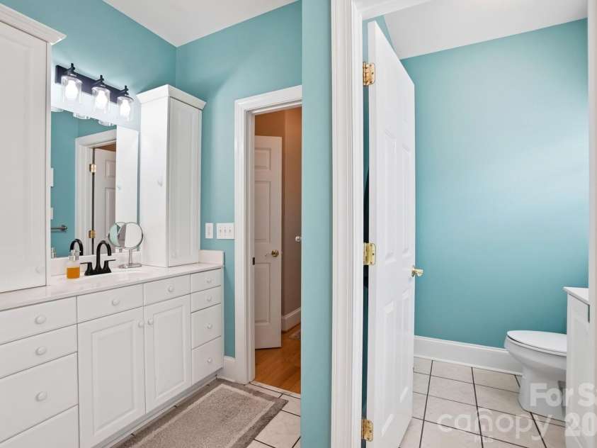 258 Glenwood Drive, Oakboro, NC 28129.  MLS# CAR4384910, YatesRealty ID 25587. Primary Bath sink 1