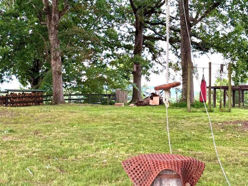 5188 Dysartsville Road, Morganton, NC 28655.  MLS# CAR4270470, YatesRealty ID 25587. A haven where children can explore, grow imagination, and have fun on the zip line too.