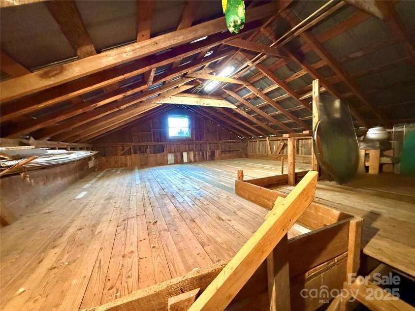5188 Dysartsville Road, Morganton, NC 28655.  MLS# CAR4270470, YatesRealty ID 25587. Garage loft with lots of storage, electricity, and plenty of space for potential other use awaits your imagination.