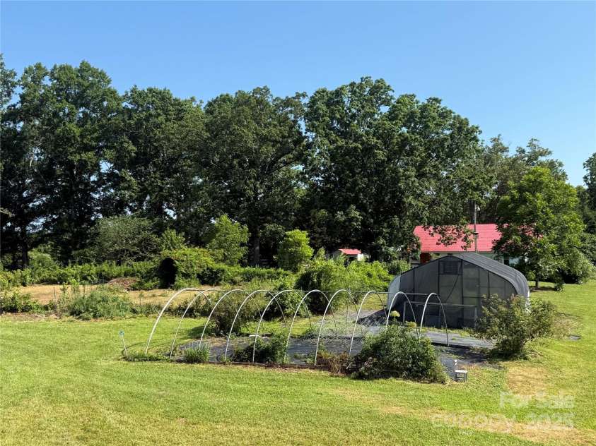5188 Dysartsville Road, Morganton, NC 28655.  MLS# CAR4270470, YatesRealty ID 25587. Hoophouse after Hurricane Helene. Structurally it is still intact and simply needs your preferred greenhouse covering.