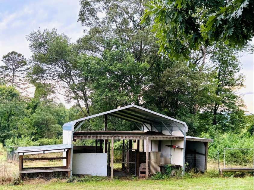 5188 Dysartsville Road, Morganton, NC 28655.  MLS# CAR4270470, YatesRealty ID 25587. Milking barn with area for hay storage above. A perfect place to aid in caring for your goats, sheep, or other animals.