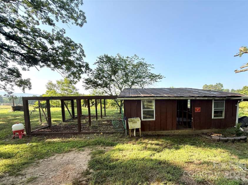 5188 Dysartsville Road, Morganton, NC 28655.  MLS# CAR4270470, YatesRealty ID 25587. The chicken coop has inside animal stalls, dry storage, and nesting boxes