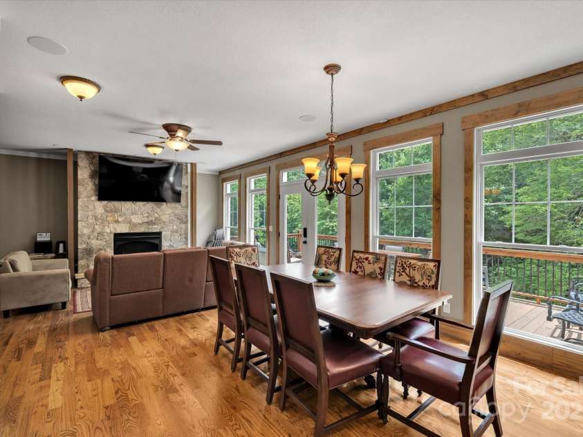 232 Sanctuary Way, Marshall, NC 28753.  MLS# CAR4151690, YatesRealty ID 2559. Ample dining area opens onto rear deck.