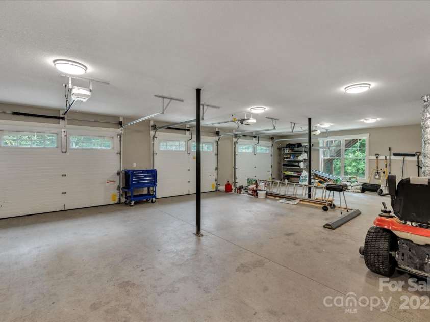 232 Sanctuary Way, Marshall, NC 28753.  MLS# CAR4151690, YatesRealty ID 2559. Over-sized 3 bay garage for all the vehicles & toys!
