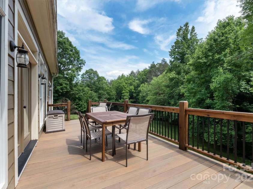 232 Sanctuary Way, Marshall, NC 28753.  MLS# CAR4151690, YatesRealty ID 2559. Rear deck offers dining & entertaining options